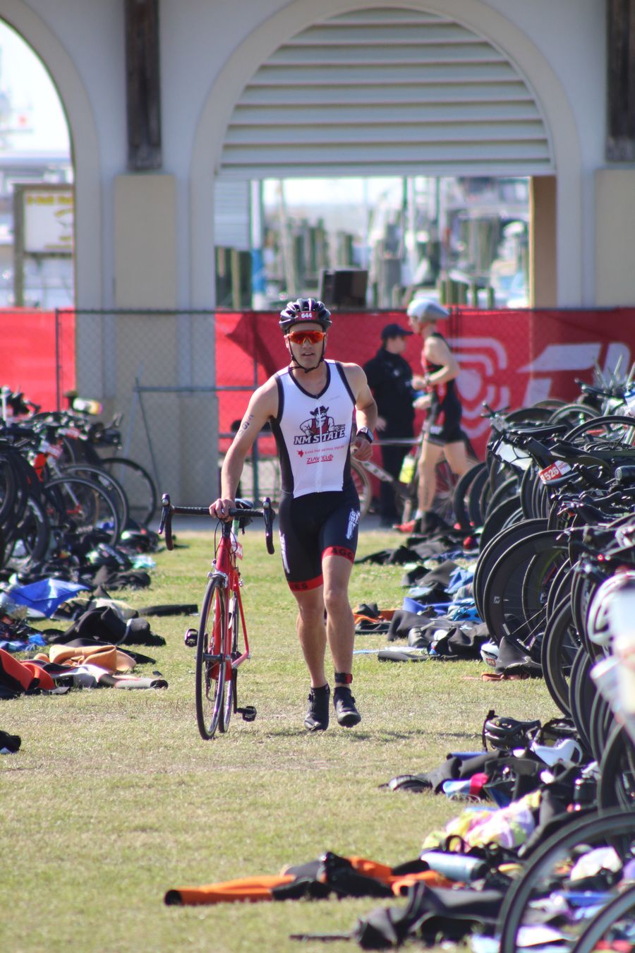 Trevon running his bike to transition at CCNC Nationals